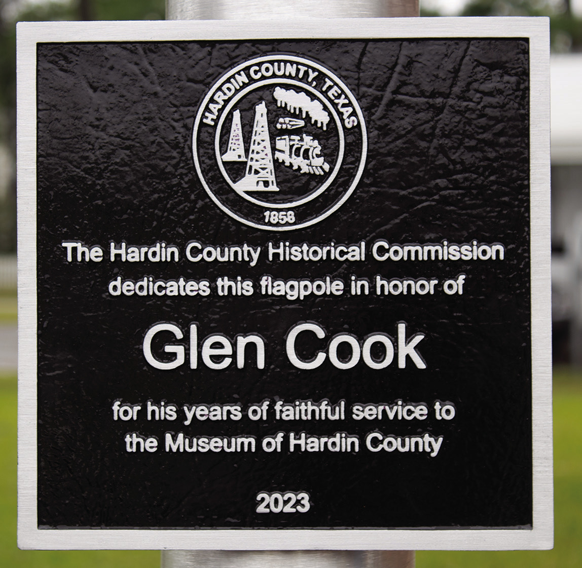 New flagpole at county museum is dedicated to honor Glen Cook