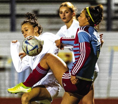 Mandi Boudreaux, a senior striker, on the Lumberton girls soccer team bounces the ball off her knee during the Raiders 8-0 victory over Vidor on Friday. 
