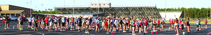 The Lumberton High School Raiders Band was seen out warming up for a practice on a warm morning before school had started.The award winning band will be performing at halftime at Raider football games. Dan Eakin Photo
