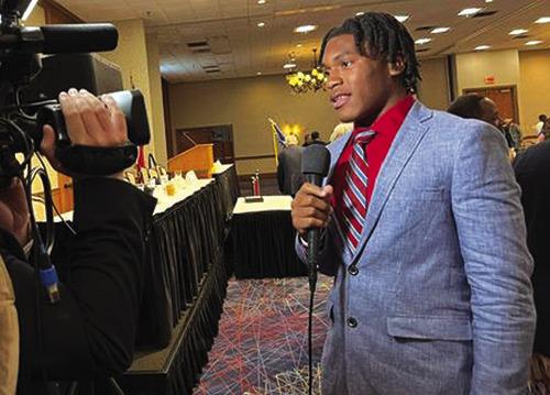 Jayron Williams, left, and Dre’Lon Miller are interviewed after receiving the prestigious Willie Ray Smith Award at a banquet at the Elagante Hotel in Beaumont. Courtesy Photos