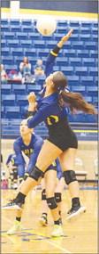 Evadale Lady Rebel gets a kill in the game against Lighthouse Friday. Melissa Riedinger photo