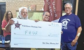 Wild Horse Mustang Car Club passes out $7,000 in donations