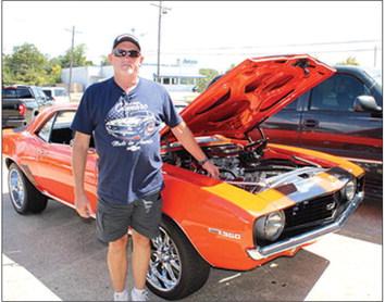 Bill Milner of Buna knows that judges will want to see the hood up on his 1969 Camaro at the Cruise’n Silsbee show at the end of this month in Silsbee and at other car shows.