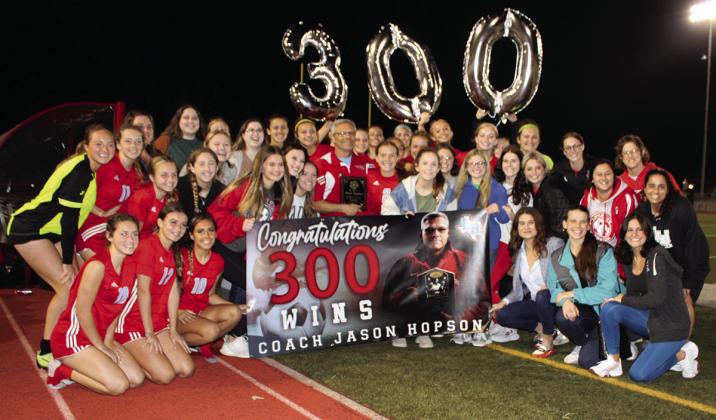 The 300th win of Jason Hopson, Lumberton High School girls soccer coach, was celebrated in a big way following their 7-0 win over the Bridge City Lady Cardinals on Tuesday night, Feb. 7, in Lumberton.The beloved coach was presented with the banner, shown in front, with a cake, following a video shown on the big screen at the football field.
