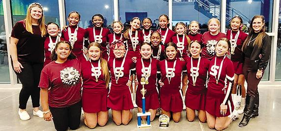 Silsbee ISD cheerleaders took to the mat on November 5 at the UCA Houston regional competitions. The Silsbee Middle School cheerleaders, shown above, won first place in the Small Junior High Traditional Routine and second place in the Small Junior High Game Day Routine. The Silsbee High School cheerleaders placed second in the DII Super Varsity Game Day Division. Courtesy Photo