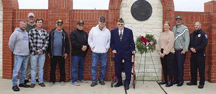 Several of the veterans present for the Wreaths Across America Ceremony last Saturday morning at Silsbee Memorial Park got together for a group photo following the ceremony.