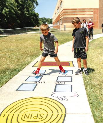 Children enjoy playing in the new sensory pathways just completed by the Silsbee Elementary School PTO. Deidra Porter photo