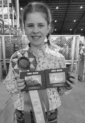 Jennifer Goodman 1st in her class with her steer at the Texas Rice Festival this past weekend. Photo courtesy of Jennifer Mason.