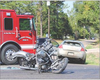 Justin Davis of Spurger was seriously injured when this motorcycle was in collision with a white Chevrolet (in background) last Friday morning. Photo by Dan Eakin