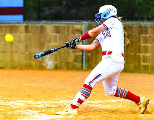 Mallory Cheek takes a healthy cut and drives a ball during the Lady Raiders recent win over West Orange Stark.