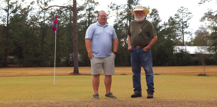 Derek Billingsley (left) and Bobby Kelley (right) discuss some of the work that needs to be done prior to the New Year’s Day holiday. Billingsley reports that Kelly has the course in the best condition that it has been in in 25 years.
