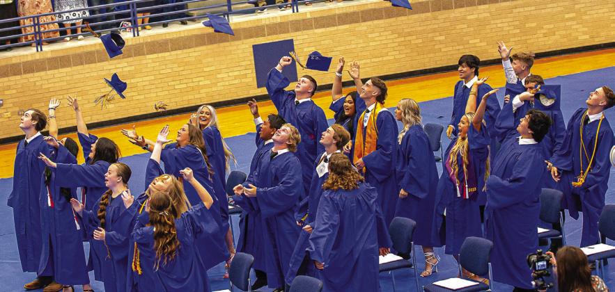 Members of the Class of 2023 at Evadale High School throw their caps into the air at the end of graduation services last Friday night. Photo courtesy of Julie Isbell
