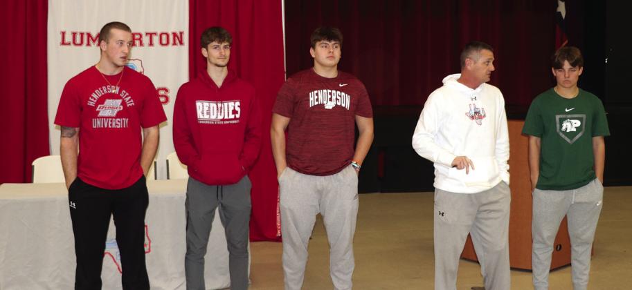 The following Lumberton players signed letters of intent on National Signing day. They include: (left to right) Aidan Millican at Henderson State, Brady Fuselier at Henderson State, Gaberiel Hernandez at Henderson State,Coach James Reyes and Carson Rea who signed a baseball scholarship.