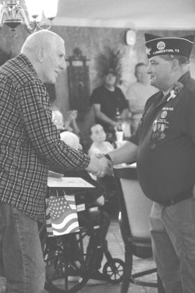 Philip Staehli, veteran of the US Air Force, was honored by members of the Lumberton American Legion squad. Photo by Amy Gonzales