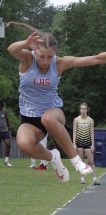 Ava Rutledge skies in the long jump event. The Lumberton girl placed sixth in the event. She was fourth in the triple jump event. Danny Reneau photo