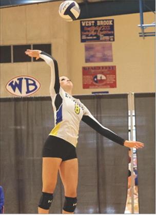 Evadale Lady RebelWhitney Carter gets a kill at a recent tournament game. Melissa Reidinger photo