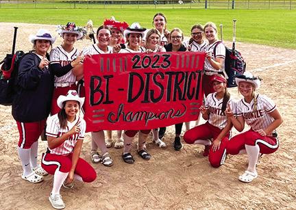 The Kountze Lady Lions proudly pose after winning the bi-district championship by defeating the Huntington Lady Red Devils in two of three games last weekend.They are, kneeling from left, Peighton Irvine, McKinley Rowinski and Kiley Kump; and standing from left, Tori Stutts, Laney Shivers, Emily Smith, Emma Wade, Kitty Coe, Shea Griffin, Cori Holyfield, Kaigen Parker, Kyla Parker and Kirstan Stanley. Not shown is MacKenzie Carlisle. Courtesy Photo