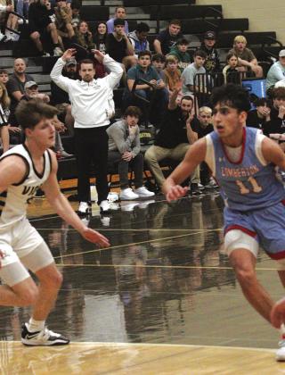 Ty Reyes drives the lane during the Lumberton Raiders 63-53 victory over Vidor on Tuesday. He scored seven points in the game. Photo by Danny Reneau