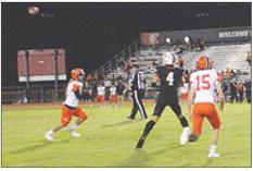 Kale Carr (No. 4) gets ready to catch one of several passes that he caught in the game against the Trinity Tigers last Friday night. One of the passes he caught from Kade Bumstead was good for a 70-yard touchdown.