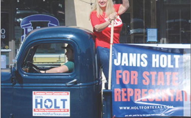 Janis Holt, who has announced she is running for state representative for District 18, waves to the crowd while in Silsbee’s annual homecoming parade last Saturday. Danny Ray Eakin Photo