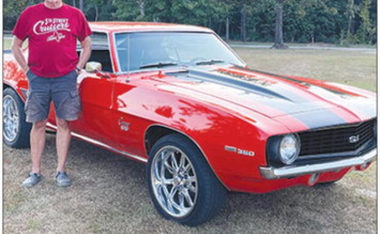 Bill Milner of Buna stands beside his 1969 Camaro which will be the featured car in the Cruise’n Silsbee event scheduled for Sept. 29-30 in Silsbee.
