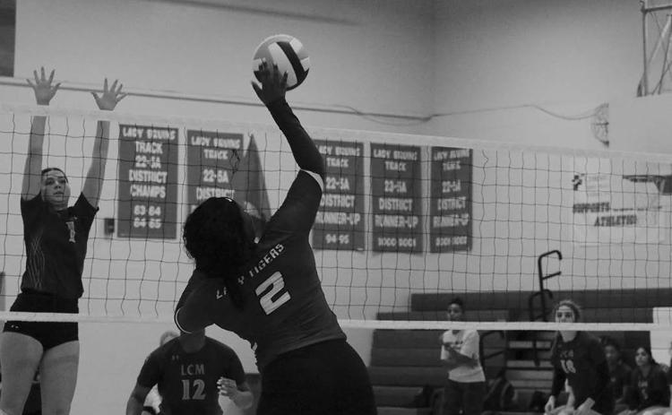 PHOTO BY CHRIS MECHE, THE BEE Kearstyn Hall going in for the kill against LCM.