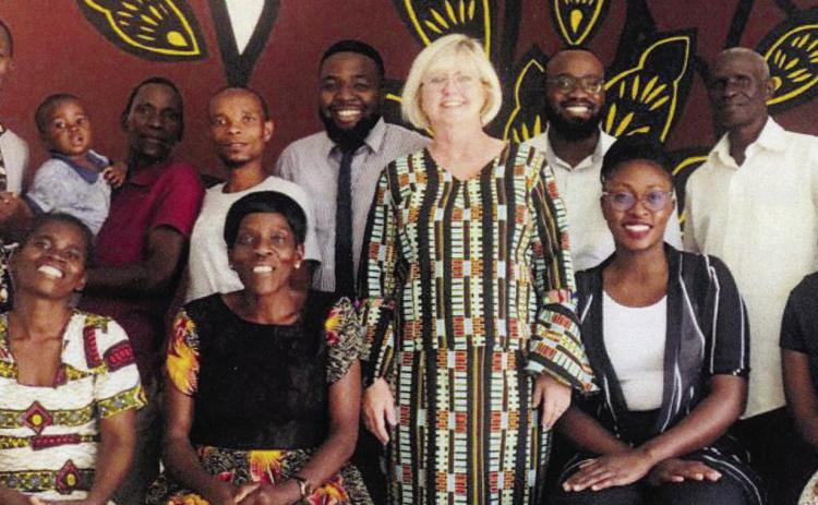 Sherrie Bumstead stands with her staff at Bethany World Ministries in Zambia.The organization provides a clinic, an orphanage and training of others to plant churches. Courtesy Photo