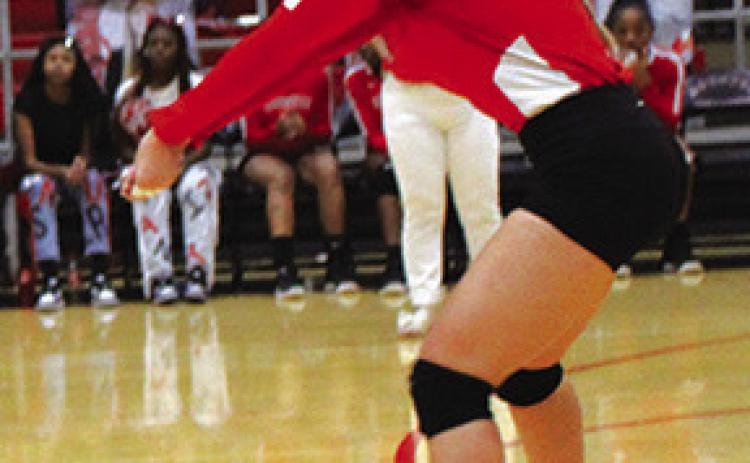 Kiley Kunk gets a dig in the volleyball game played Friday afternoon at Kountze High School.About an hour after the game,she was crowned 2023 Homecoming Queen.