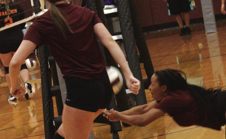Kalia Ashworth dives to the floor in an attempt to save a ball during the Silsbee volleyball Scrimmage on Saturday. This time the attempt was unsuccessful but that will change as the player hone their skills during the season. Photo by Danny Reneau