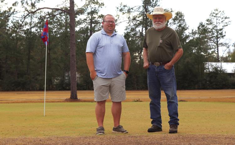 Derek Billingsley (left) and Bobby Kelley (right) discuss some of the work that needs to be done prior to the New Year’s Day holiday. Billingsley reports that Kelly has the course in the best condition that it has been in in 25 years.