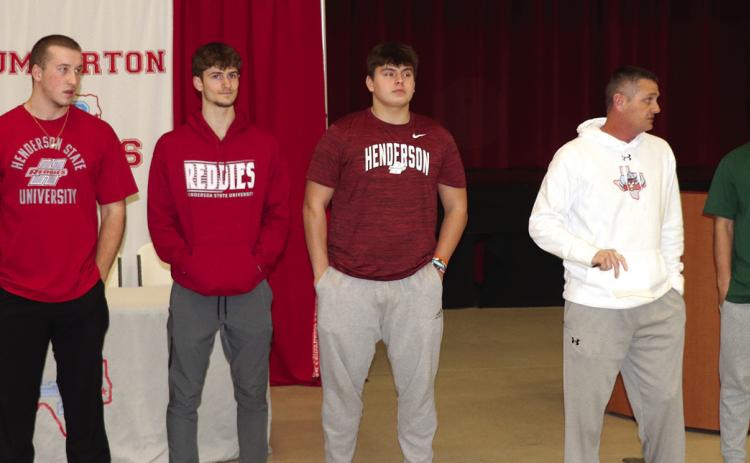The following Lumberton players signed letters of intent on National Signing day. They include: (left to right) Aidan Millican at Henderson State, Brady Fuselier at Henderson State, Gaberiel Hernandez at Henderson State,Coach James Reyes and Carson Rea who signed a baseball scholarship.