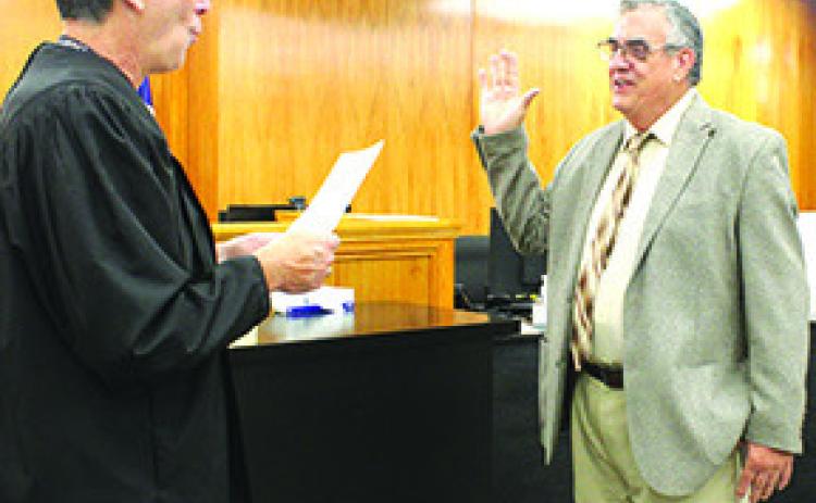 Danny Reneau,who was elected mayor of Silsbee in the May 6 election, was administered the oath of office by District Judge Steve Thomas at the Hardin County Courthouse Tuesday morning.