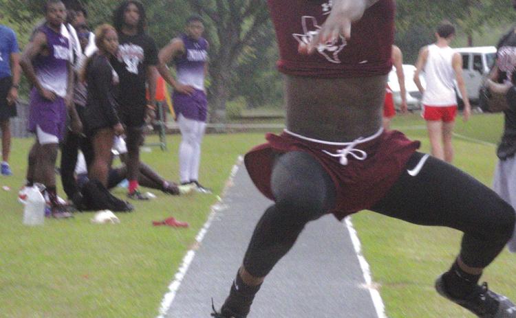Raydrian Baltrip of Silsbee snagged individual honors with some outstanding jumping during the Silsbee Relays last Thursday. The sophomore won the long jump with a leap of 22’10” and he set a new school record in the Triple jump with a hop, skip and jump of 47’9”. This was the fourth straight meet that he has broken a Silsbee school record. Photos by Danny Reneau
