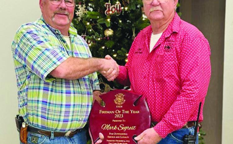 Mark Segrest, left, is presented Silsbee Fire and Rescue’s 2023 Fireman of the Year Award by Silsbee Fire Chief Robin Jones. Courtesy Photo