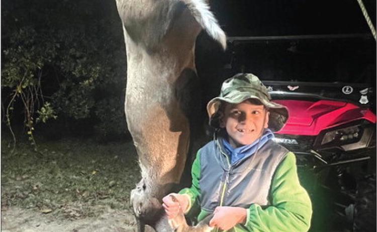 Ethan Rennick, 8 years old killed his first deer at Massey Lake Hunting Club in Silsbee on November 12th, 2022 at 5 PM. He was sitting with his dad Mark Rennick. Ethan was shooting a Remington 243 bolt action. Courtesy Photo